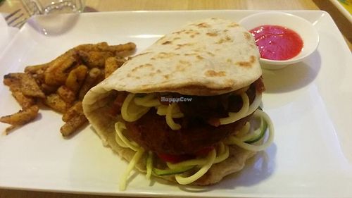Bar-Bea Burger 83 Kn (~11€)
Barley-bean-smoked seitan burger. Naan bread to help keeping your fingers clean. Sweet potato sticks. Topped with onion BBQ and homemade senf sauce. Vegan.  at Nishta in Dubrovnik