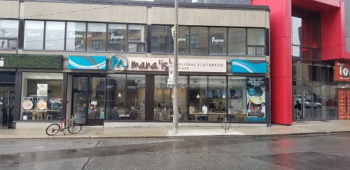 Outside at Mana'ish Global Flatbread Cafe in Toronto