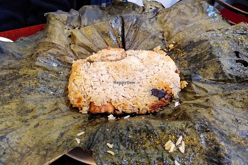 Rice with "chicken" wrapped in a lotus leaf at Bodhi Vegan in Paris