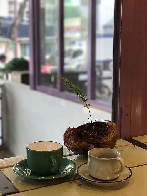 Malaysia Liberica coffee, with milk on the left and black on the right. at Purple Miao in Kuala Lumpur