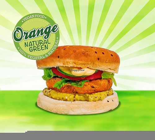 Lentils burger, pumpkin, ranch sauce, pickles, tomatoes, lettuce and vegan cheddar cheese at Orange Natural Green in Buenos Aires