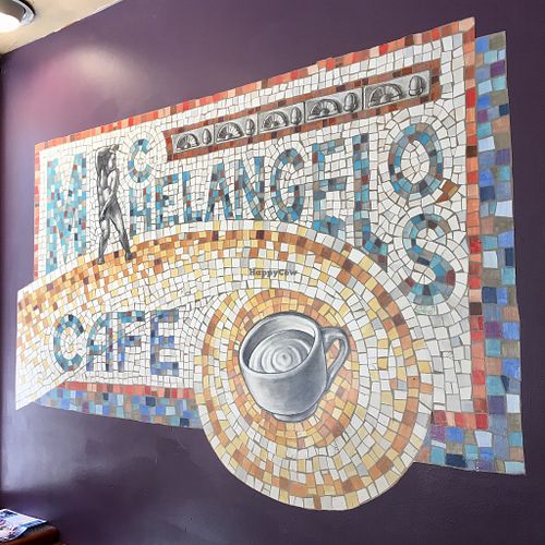 Beautiful mosaic. Artwork all over! at Michelangelo's Coffee House in Madison