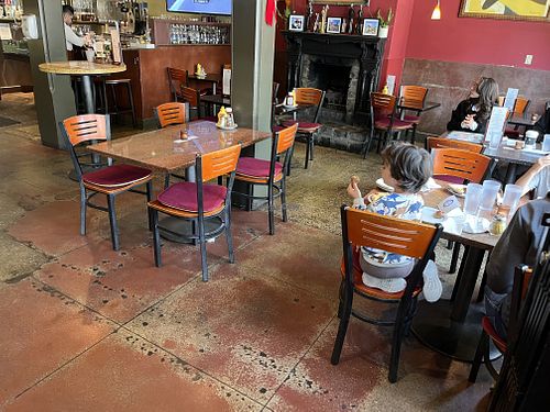 Cozy indoor seating  at CyBelle's Front Room in San Francisco