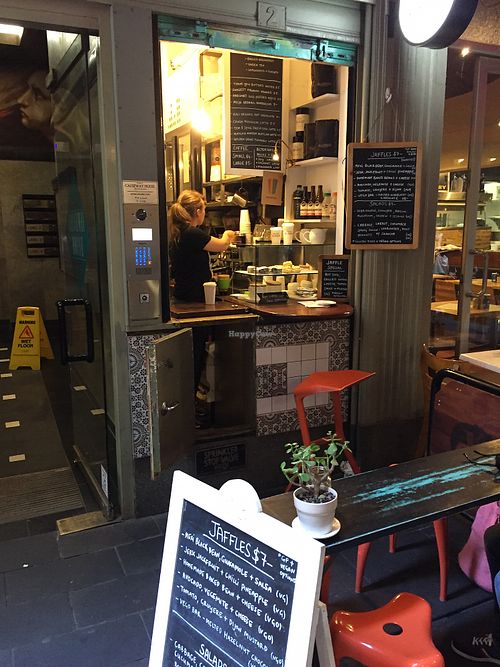 Kiosk shop front with seating at Union Kiosk in Melbourne