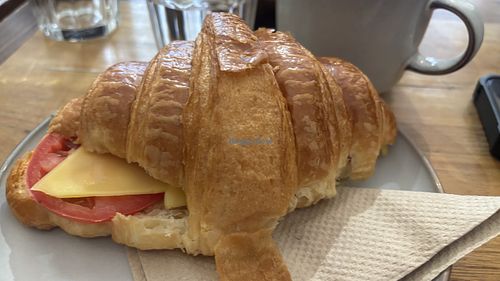 Toasted Croissant with “cheese” and tomato  at Union Kiosk in Melbourne