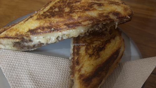 The special - delicous! “Pork” with cheese, garlic butter and apple  at Union Kiosk in Melbourne