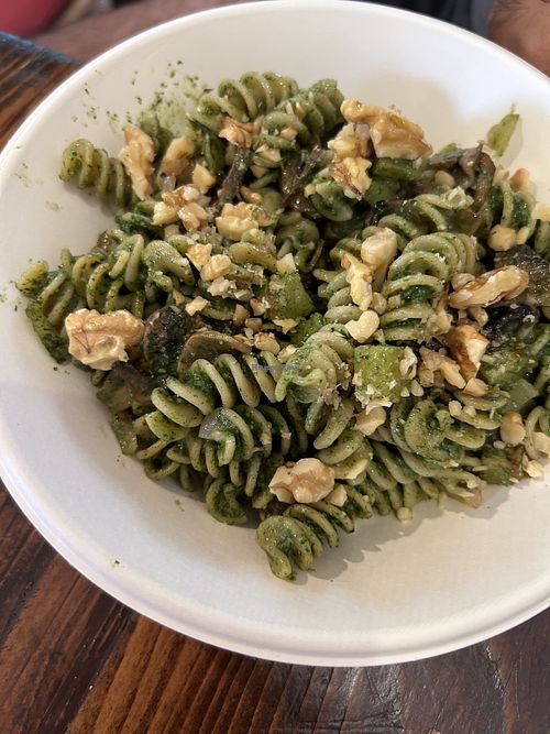 Fusili pasta with ground nuts on top  at Mangiamore in Reggio Emilia