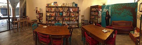 Back dining room with books to peruse. at Mangiamore in Reggio Emilia