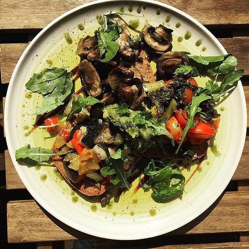 Vegan roasted tomatoes, mushrooms and Mediterranean veg on gluten free toast at The Wilds in North London