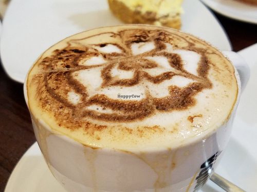 Cappuccino with almond milk at Freedom Cakes Bakery in Madrid