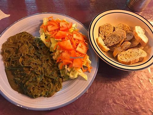 Vegan pasta with green mole, salad and vegan bread.  at Tiramisu in La Paz