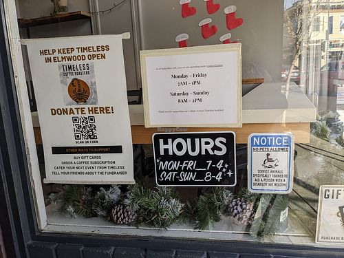 Window signs at Timeless Coffee Roasters and Bakery in Berkeley