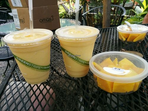 Smoothie no 4 and fresh cut mango. Bliss at The South Kona Fruit Stand in Captain Cook