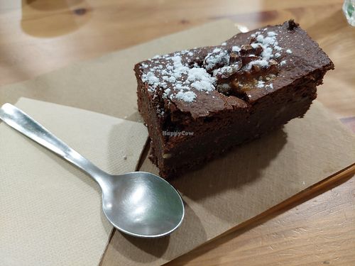 The vegan brownie whick later I discovered it may contain dairy products at Just Good in Sevilla