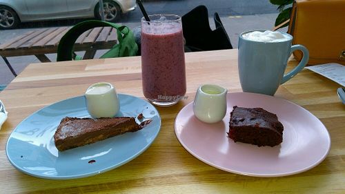 Chocolate tart, raspberry brownie and drinks  at Serenity Now in Glasgow
