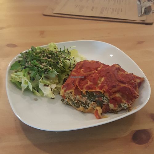 Spinach and 'ricotta' lasagne and salad at Essential Vegan @ Ten to One Bar in North London