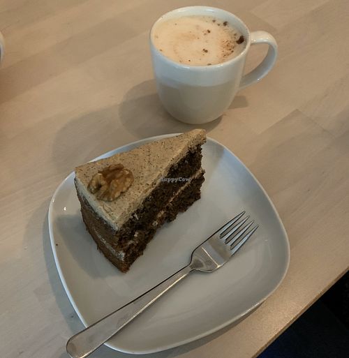 Coffee and walnut cake with chai latte at Essential Vegan @ Ten to One Bar in North London