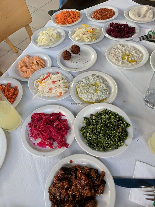 Variety of salads and hummus served  at Naurah in Abu Ghosh