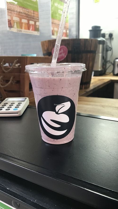 My breakfast raw smoothie with oats cashews oats almond milk strawberries  and cashews. So yum at Wholesome Juicery in Nottingham
