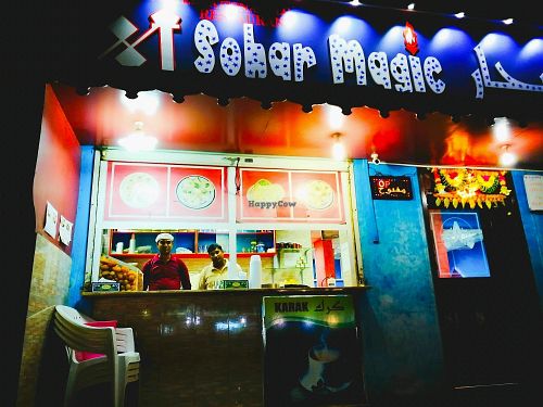 Entrance and takeaway counter at night.  at Sohar Magic in Sohar