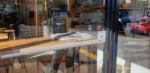 Light airy Cafe, with a HappyCow sticker at FacePlant in Geelong