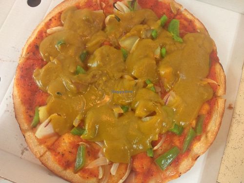 Pizza with curry at Bifteki House in Glasgow