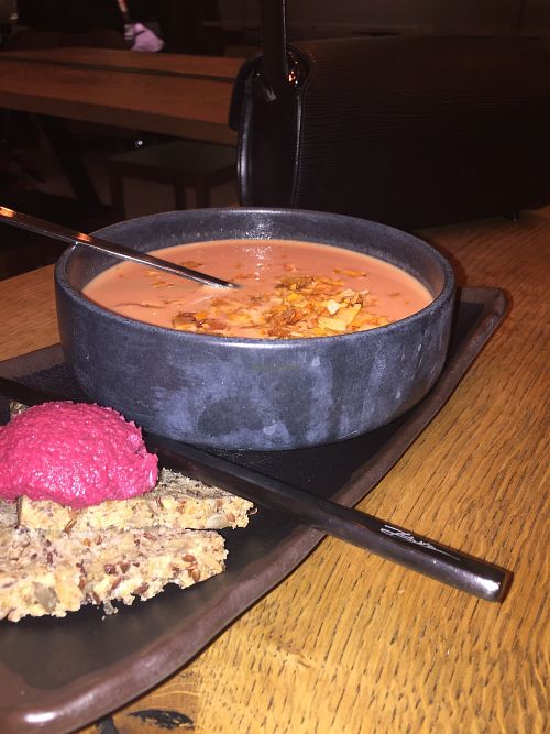 Coconut curry with bread and beetroot hummus at Glo in Copenhagen