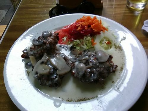 "Meatballs" with mushroom sauce and salad at Bio Leben in Lima