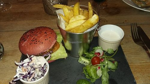 Vegan burger with salad, coleslaw and chips at Peaky Blinders Bar  in Paignton