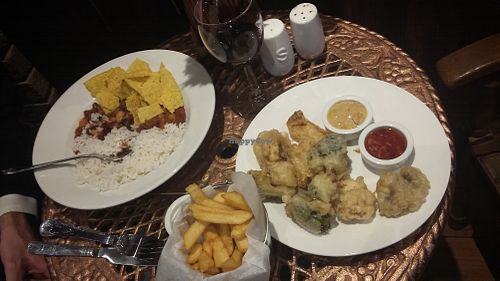 5 bean chilli with rice & nachos with sour cream; tempura vegetables with satay & sweet chilli dips. at Peaky Blinders Bar  in Paignton