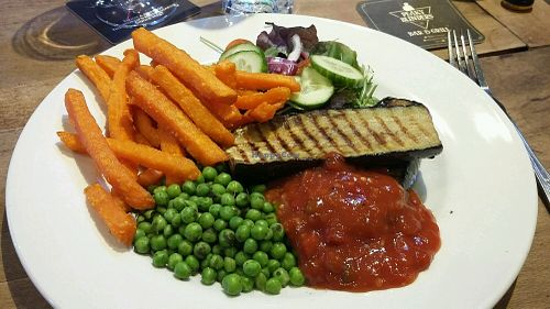 Tasty Grilled aubergine steak £8.  28/2/18 at Peaky Blinders Bar  in Paignton