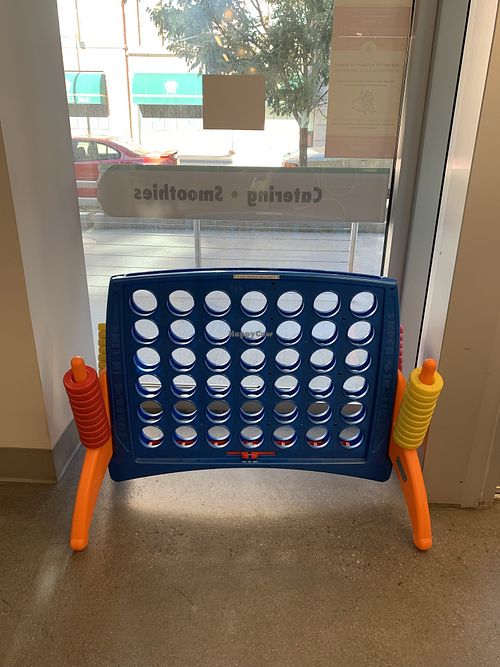 A giant connect four game! 😃 at Superfruit Republic in Denver