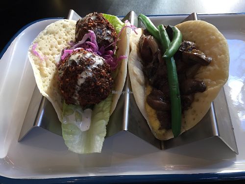 Yemeni Lahuh Bread - Right: Green beans, mushroom ragu, fresh creamed corn. Left: Falafel, tahini, pickles and parsley at Green Man's Arms in Carlton