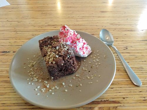 brownie slice with coconut yoghurt, $5 at Amore Food Market & Cafe in Timaru