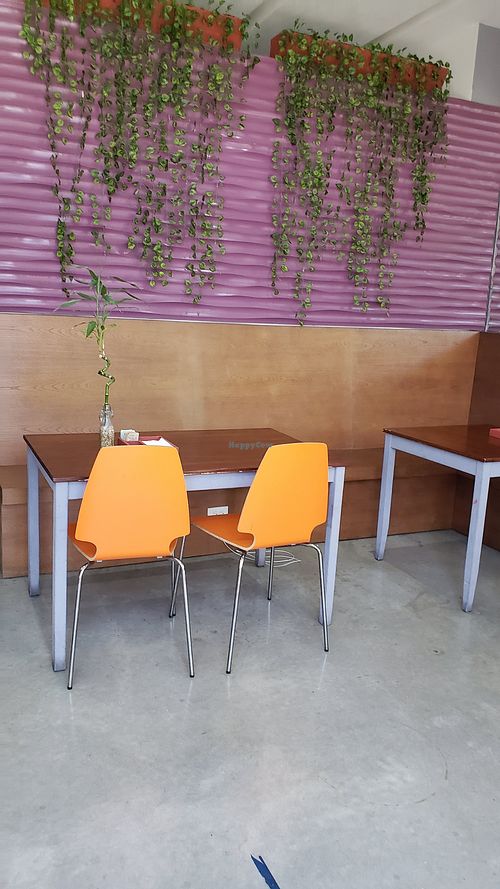 Seating for 10 plus 7 counter bar stools at Cure Cafe in Miami