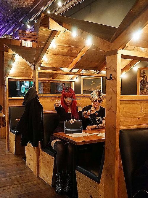 La Carmina inside the Twin Peaks cabin booths at vegetarian restaurant Black Lodge Broadway.  at The Black Lodge - Broadway in Vancouver