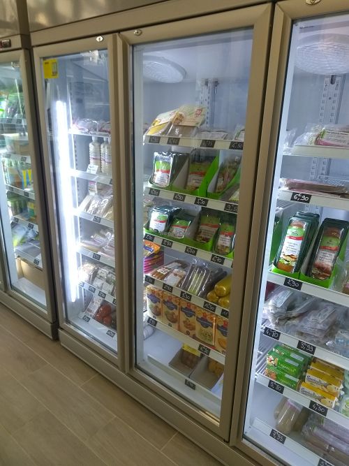Vegan cheezes in the fridge at 2VShop in Paris