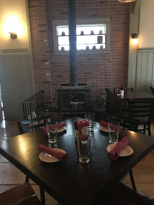 Wood stove seating at Greenhouse Cafe & Tavern in Burlington