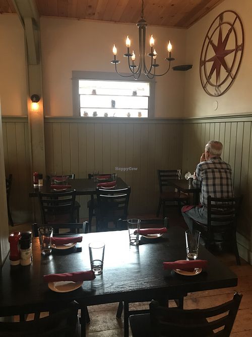 Contemplating the vegan options at Greenhouse Cafe & Tavern in Burlington