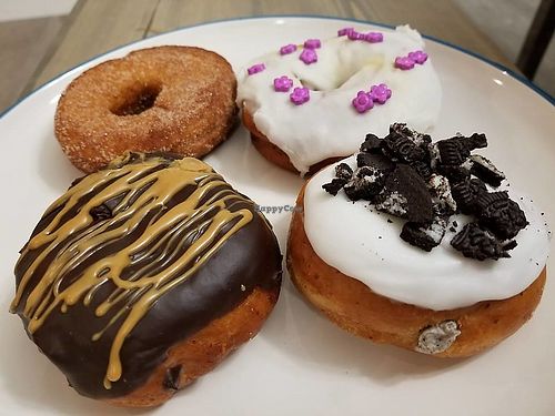 Vegan donuts. Peanut butter and chocolate, Oreo stuffed (my favourite), cinnamon... at VegaBoo Cat Haven in Regina