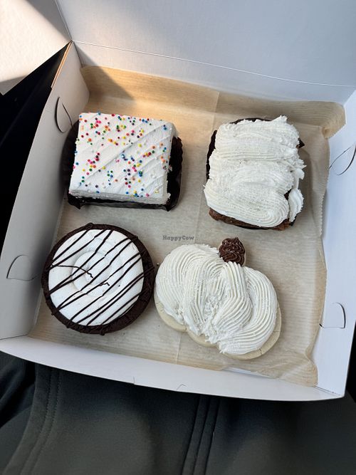 Top left: Birthday cake brownie (my fav), top right: carrot cake bar (sooo moist), bottom left: marshmallow chocolate cookie, bottom right: iced cookie  at Chubby Bunny Bakery in Hamilton