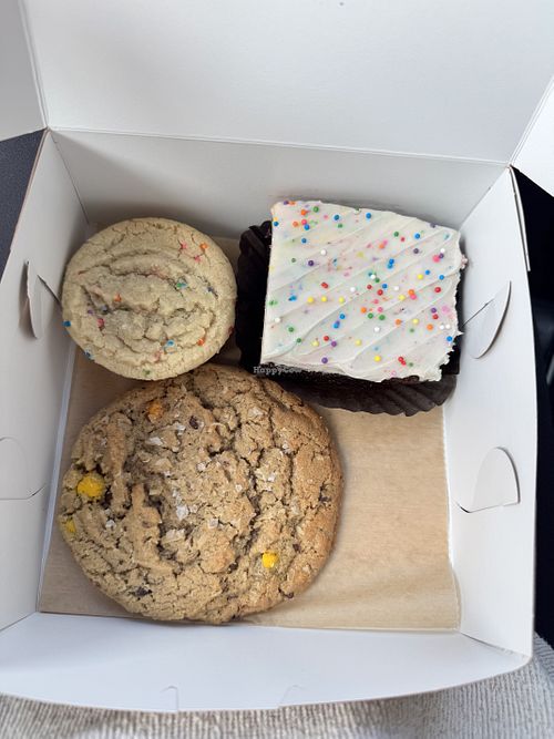 Top left: birthday cake cookie sandwich, top right: birthday cake brownie, bottom: monster cookie  at Chubby Bunny Bakery in Hamilton