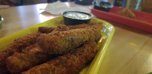 Fried pickles with vegan dip at Melt Bar & Grilled in Canton