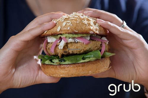 Hippie Chickpea - Meatless burger made with ground chickpeas, cucumber avocado dressing, arugula, cucumber slices, pickled red onions, and queso fresco served on a wheat bun. at Grub Burger Bar in The Woodlands