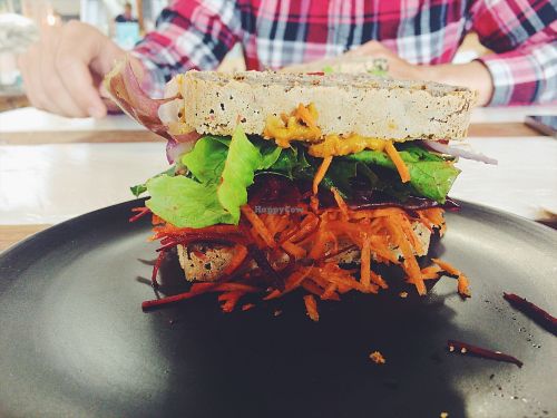 Our amazing vegan sandwich with fresh vegetables and homemade bread at Oh My Goodness Specialty Breads in Hastings