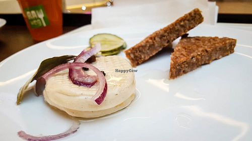 RAWmelin with pickled cucumber and bread at bistRAWveg - Chodov Shopping Center in Prague