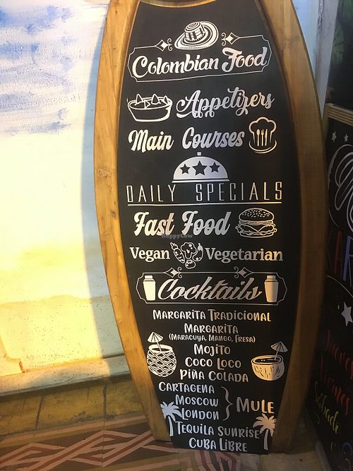 Exterior sign at Punto Tropical in Cartagena