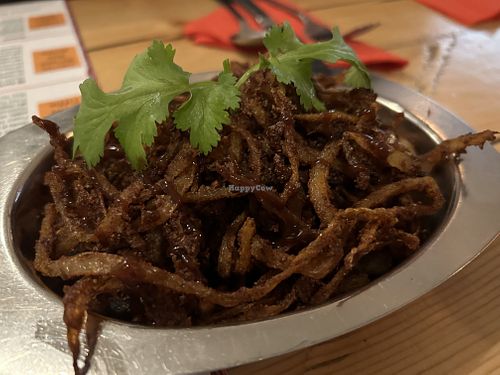 Onion Ragi Pakora (vg) – onion fritters made with pearl Millet flour, green chillies, coriander, curry leaves  at Dosa Kitchen in Newcastle Upon Tyne