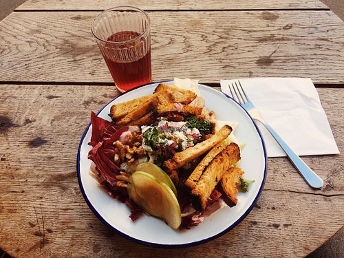 New summer (and huge) salad with blue cheese, delicious! at Aujourd'hui Demain Cafe in Paris