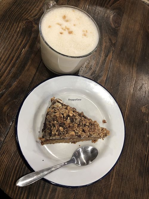 Cake and peanutmacciato at Aujourd'hui Demain Cafe in Paris